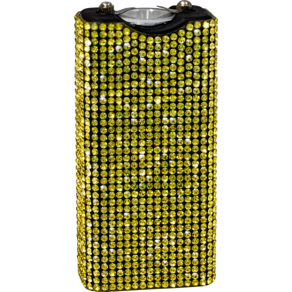 This image features a rectangular 9-volt battery encrusted with numerous small, sparkling yellow rhinestones that cover the entire visible surface. The rhinestones are arranged in a tightly-packed, grid-like pattern, enhancing the battery's aesthetic appeal with a luxurious, dazzling appearance. The top of the battery is exposed, showing the typical 9-volt