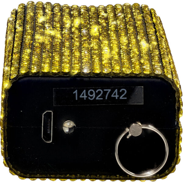 The image depicts a small, square-shaped device adorned with bright, yellow rhinestones. The top and sides of the device are covered in rows of these sparkling rhinestones, creating a luxurious and eye-catching appearance. The front side of the device is black and features a unique identification number 1492742. There is a USB port on the left side