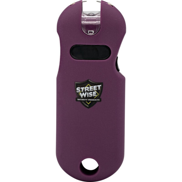 The image displays a purple personal security stun gun device. The product features a compact, ergonomic design with a prominent brand logo labeled Street Wise Security Products on the front. The device has a rounded top and a small opening at the bottom, possibly for attaching a keychain or lanyard. It appears to have a black activation button centrally located