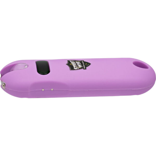 The image shows a purple personal safety device, specifically a stun gun. It has a rounded, compact design with smooth edges for easy handling. The surface features a brand emblem labeled Street Wise. Near the top, there is a black button likely used for activation. The device also includes a metal tip indicative of electrodes for the stun function. A small