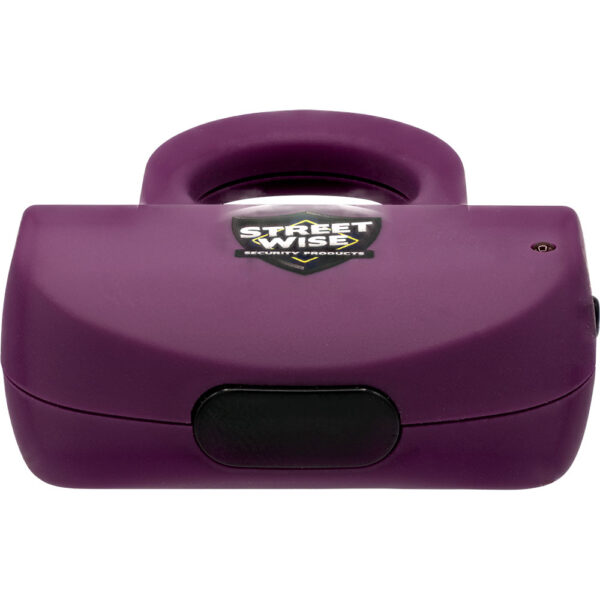 The image shows a purple personal safety alarm branded as Streetwise Security Products. The device has a compact design with a circular top grip for easy handling. The Streetwise logo is prominently displayed on the front in black and white. The casing appears to be made of durable plastic, featuring a rounded edge and a small button on the side for