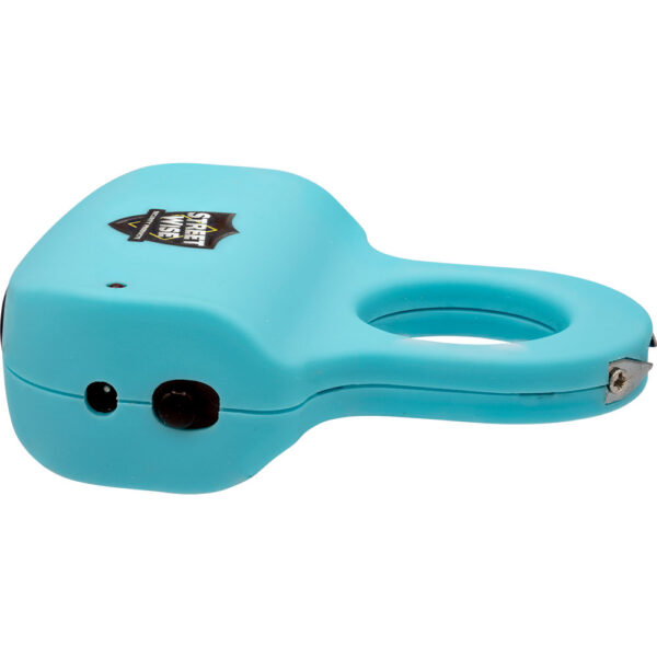 The image shows a compact, handheld self-defense tool with a bright turquoise blue casing. The device features a circular opening, likely for grip or attachment purposes. The exterior is smooth and rounded, designed for easy handling. Visible on the side is a black charging port, which indicates it is rechargeable. The brand logo, Streetwise, is printed in