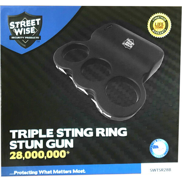 This image is a graphic of a product package for the Streetwise Security Products Triple Sting Ring Stun Gun. The package features a black three-ring stun gun prominently displayed. The product's voltage is listed as 28,000,000. Noteworthy features include a gold emblem indicating a lifetime warranty. The background has a carbon fiber texture, and