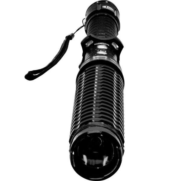 Front view of Twist of Fate stun baton flashlight showing LED lens and wrist strap