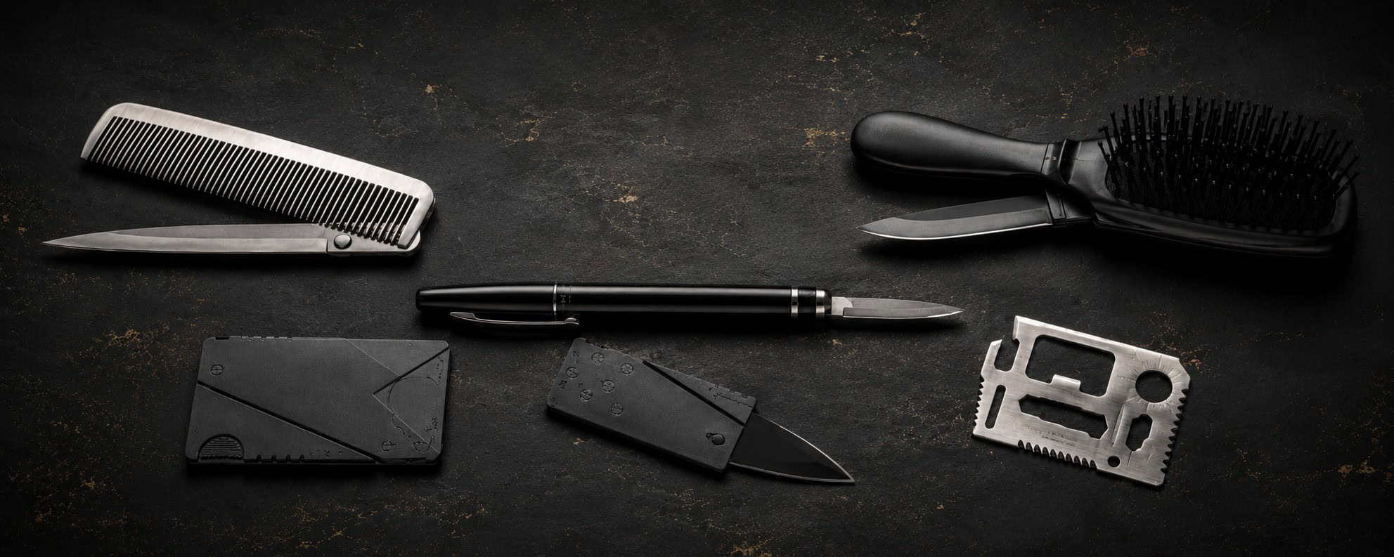 Disguised self-defense knives including a comb knife, hairbrush knife, pen knife, credit card knife, and wallet-size survival tool arranged on a dark surface.